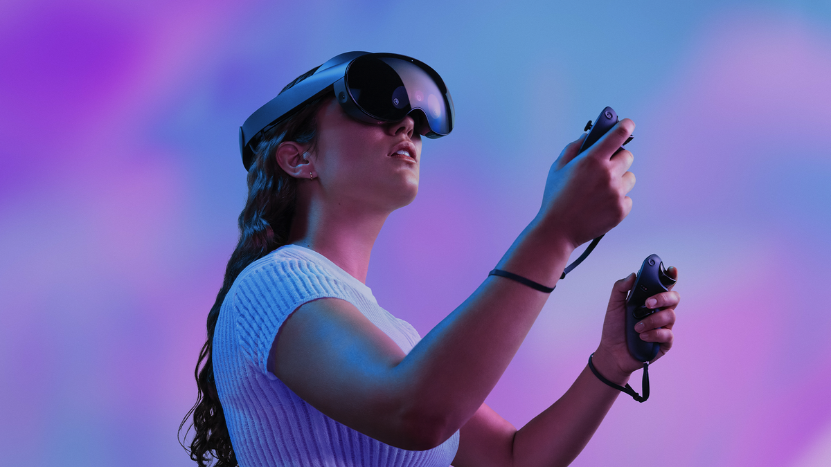 Someone wearing the Meta Quest Pro and using the controllers.