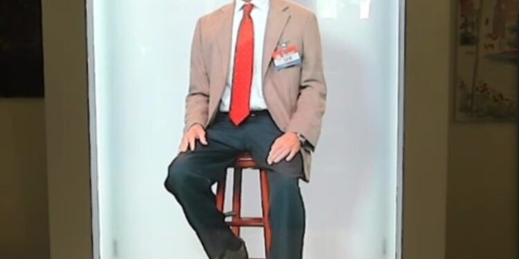 As Black Friday shoppers head to Walmart, a hologram Sam Walton rallies them in Arkansas