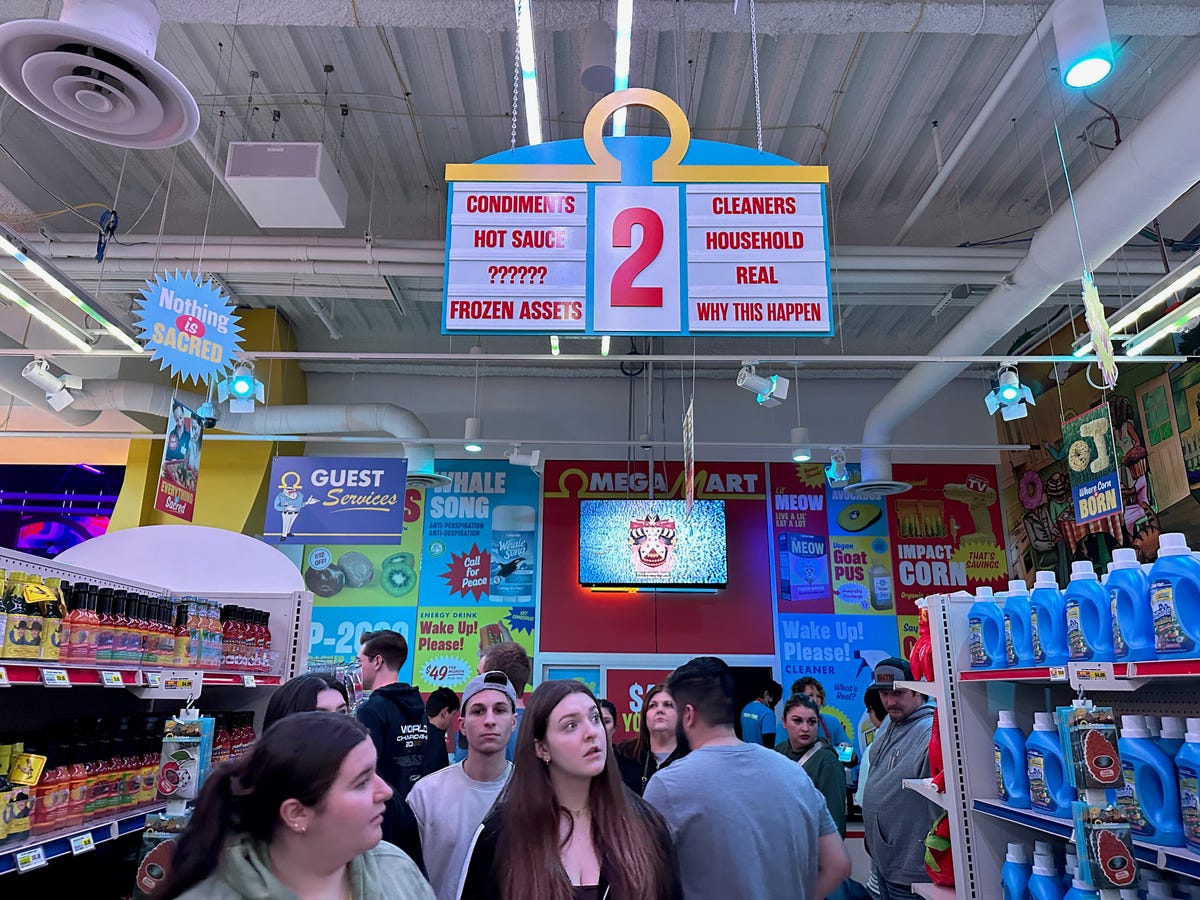 A convenience store aisle with joke products at Meow Wolf's Omega Mart.