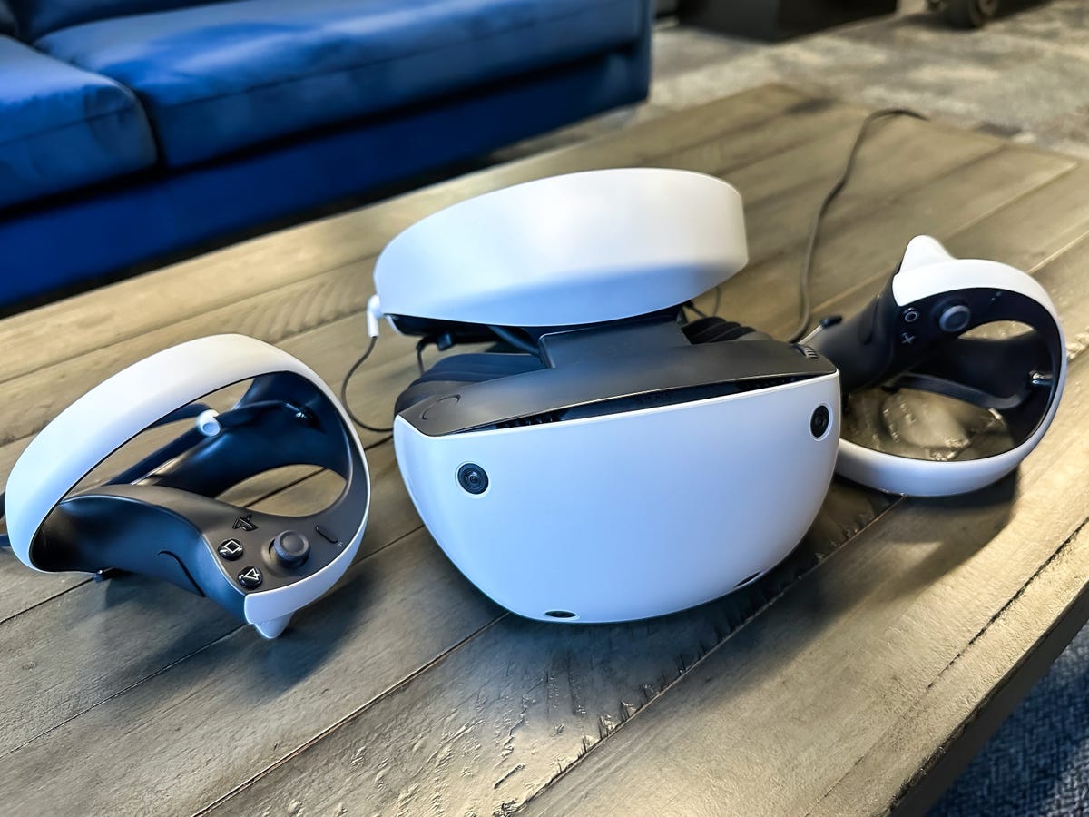 The PSVR 2 and its controllers on a table